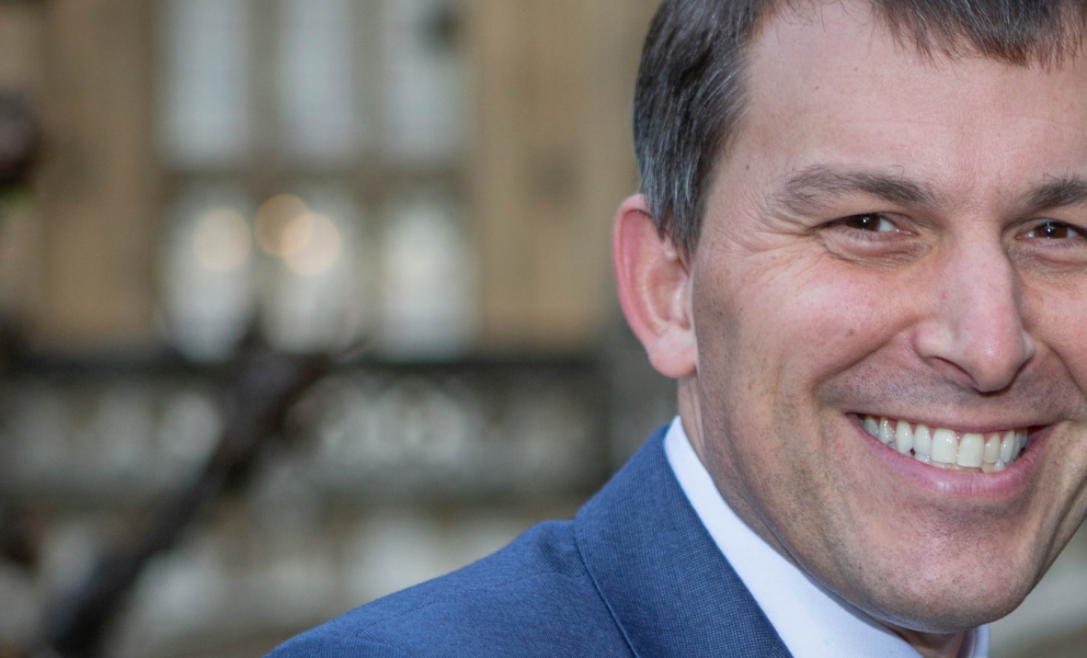 Official parliamentary headshot of John Glen 