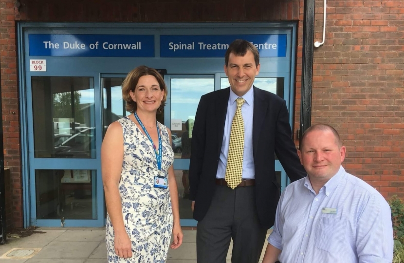 John outside the Spinal Treatment Centre