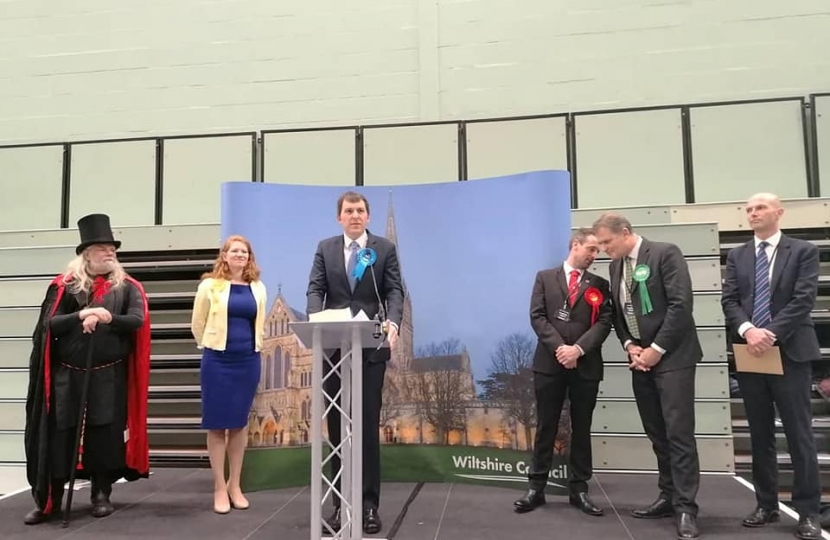 John giving a speech after results were announced