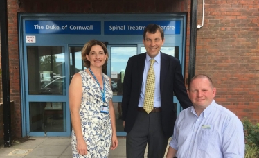 John outside the Spinal Treatment Centre