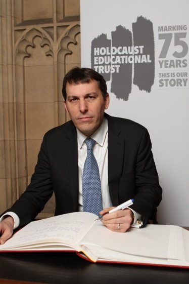 John signing pledge at Holocaust Memorial Day 2020